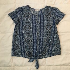 Blouse with a tie at bottom